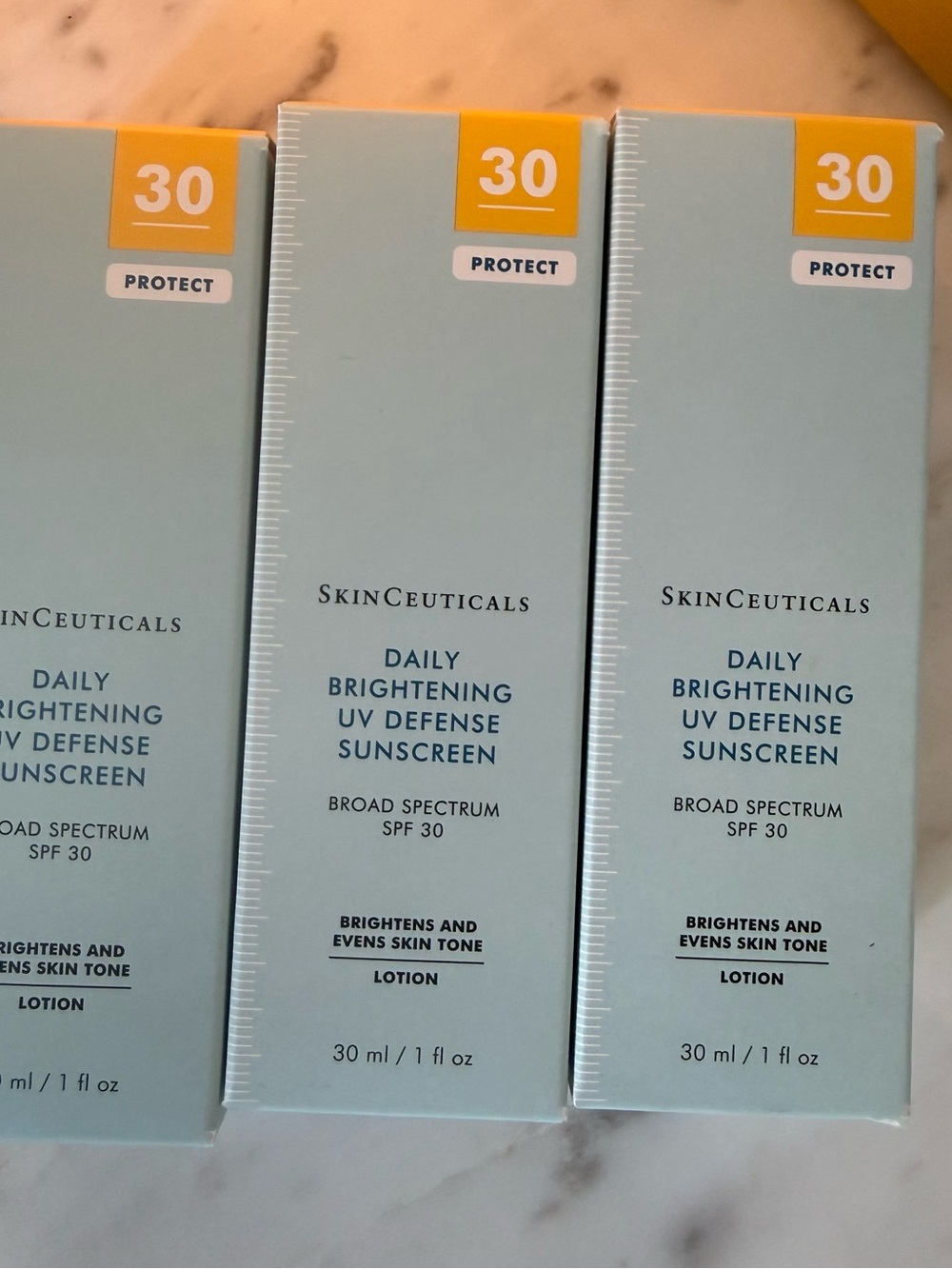 SkinCeuticals Daily Brightening UV Defense Sunscreen SPF 30 - Light Blue
